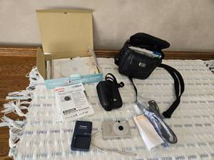 lot 82 image: Canon Powershot SD1000 and Carrying Case
