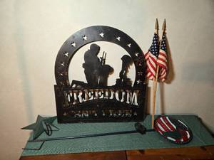 lot 226 image: Patriotic Metal Sign of a Soldier Kneeling and Says Freedom Isnt Free and Miscellaneous Flag Items