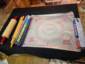 lot 335 image: Rolling Pins, Partial Parchement Paper, Tupperware Pastry Mats