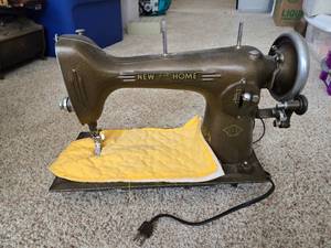 lot 341 image: Vintage New Home Sewing Machine