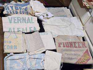 lot 401 image: Old Seed Bags for Sewing - Some Faded and Cut