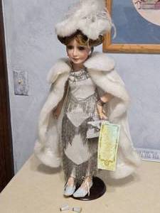 lot 444 image: Millicent Collectible Doll - The Jazz Age Edition by Tuss Inc. (broken high heels)