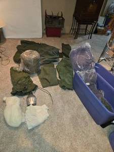 lot 482 image: Lot of Military Surplus Clothing and Accessories in Blue Storage Bin