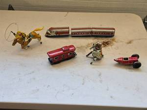 lot 562 image: Vintage Wind-Up Tin Toys Lot - Train Set, Cowboy, Dog, and Race Car - Not all complete and Some mechanical components may require attention.