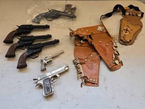 lot 565 image: Vintage Toy Cap Gun Collection with Leather Holsters