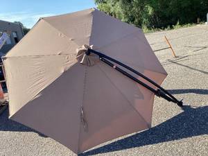 lot 567 image: Tan Patio Umbrella, Measures 120 wide