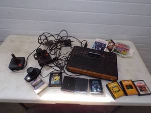 lot 6 image: Atari Vintage Game Console with Games