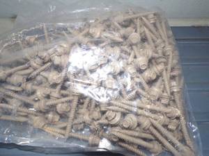 lot 33 image: 2 Roofing Screws Tan