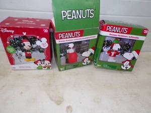 lot 68 image: Peanuts and Mickey Mouse Inflatables