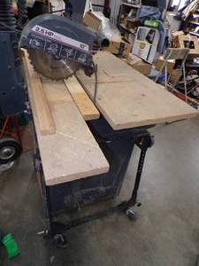 lot 24 image: Craftsman 10  2.5 HP Radial Arm Saw with Stand and wheels