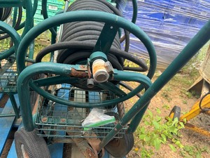 lot 6 image: Two Garden Hose Carts with Hoses