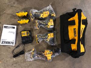 DEWALT ATOMIC 20-Volt Lithium-Ion Cordless Brushless Combo Kit (4-Tool) with (2) 2.0Ah Batteries, Charger and Bag  Customer Returns See Pictures