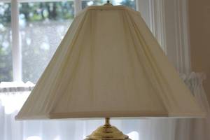 lot 26 image: Elegant Ceramic Table Lamp with Cutout Design and Fabric Shade