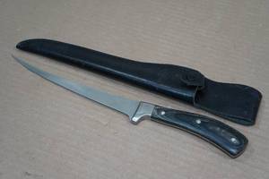 lot 8 image: Cabelas 13 Fillet Knife with Leather Sheath