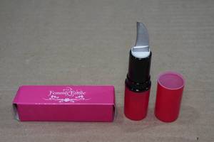 lot 14 image: Femme Fatale Lipstick Knife