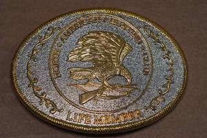 lot 61 image: Vintage North American Hunting Club Belt Buckle