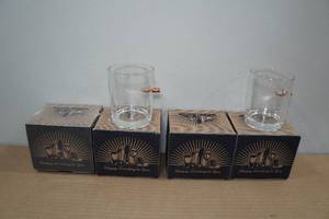 lot 98 image: 4 Lucky Shot Rocks Glasses with Embedded Bullets -2 Designs