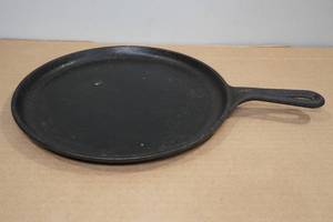 lot 141 image: Lodge Cast Iron Griddle Pan