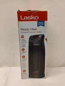 lot 7 image: NEW LASKO PORTABLE CERAMIC HEATER