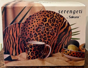 lot 148 image: Sakura Serengeti Stoneware 16 Piece Service For 4 Set Sue Zipkin