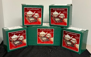 lot 207 image: Cup of Christmas Tea Teapot and 4 Cups with Saucers