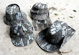 lot 394 image: Four Tree Bark Patterned Hats