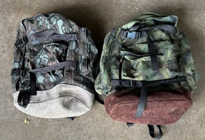 lot 425 image: Cabelas and Gander Mountain Camouflage Backpacks