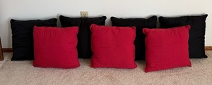 lot 442 image: Seven Red and Black Accent Pillows