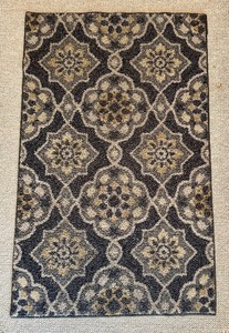 lot 86 image: Small Gray Throw Rug