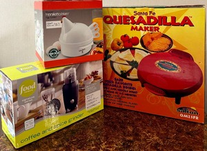 lot 91 image: New Kitchen Helpers Including a Quesadilla Maker, Egg Maker and Coffee and Spice Grinder