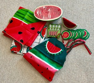 lot 97 image: Fun Watermelon Apron, Table Clothes, Candles and More
