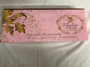 lot 154 image: Daveliou Caligraphy Set - Pink