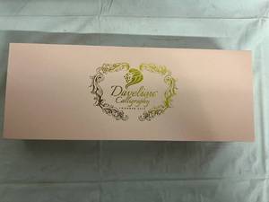 lot 148 image: Daveliou Caligraphy Set - Pink