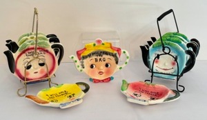 lot 47 image: Vintage Teabag Holders including a Vintage Lefton Dainty Miss Teabag Holder