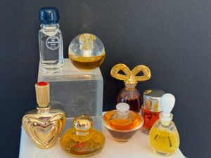 lot 41 image: Seven Miniature Perfume Bottles  Seven Miniature Womens Fragrances
