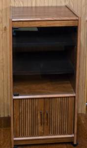 lot 203 image: Wheeled Glass-Fronted Stereo Cabinet