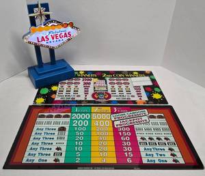 lot 224 image: Fun Slot Machine Inserts Plus Las Vegas Light