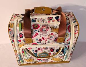 lot 278 image: Fun and Versatile Wheeled Lily Bloom Carry-on