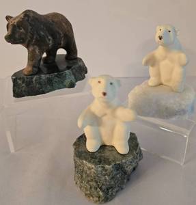 lot 284 image: Three Expressive Maigon Daga Bear Sculptures