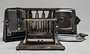 lot 304 image: Three Vintage Drop-Side Toasters