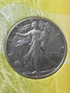 1943 US WALKING LIBERTY HALF DOLLAR IN AN INFORMATION SLEEVE