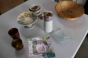 lot 7 image: Assorted Decorative Lot Glass Plates, Ceramic Ware, Wooden Figurines, and More