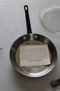 lot 13 image: Assorted Household Items  Pan, Plate, Candle Holder, and More