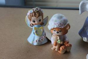 lot 22 image: Lot of 15 Enesco Porcelain Figurines