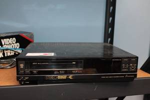 lot 46 image: JVC VHS Player and Albinar 9900 VideoCamera Tripod