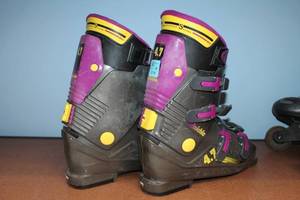 lot 53 image: Lot of Outdoor and Sports Equipment Ski Boots, Rollerblades, Camping Gear, and More