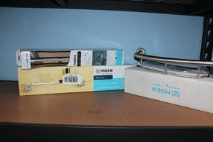 lot 56 image: Lot of Moen Bath Accessories Grab Bar, Glass Shelf, and Corner Basket