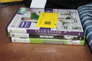 lot 57 image: Mixed Lot of Assorted Bags, Xbox 360 Games, and Styling Kit