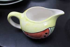 lot 99 image: Assorted Decorative and Functional Tableware Collection
