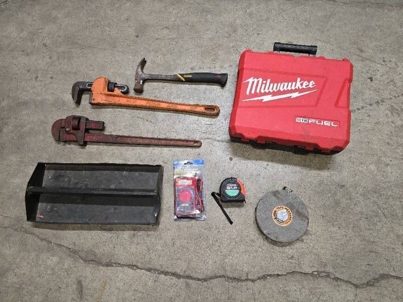 lot 71 image: Misc tool batch - 2 pipe wrenches, Milwaukee tool box, tool tray, claw hammer, 25 measuring tape, Vintage Eslon 100 ft tape measure reel and new multimeter